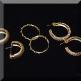 J02. Gold earrings. 